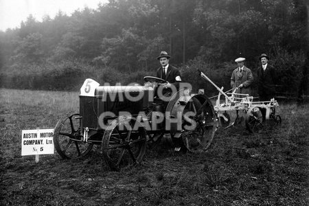 Austin tractor and plough 1920s